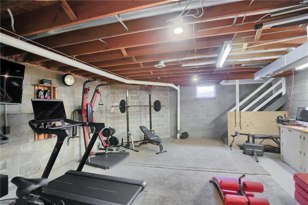 110 Larkspur Circle Butler, PA 16002 - Photo 41 of 50 Flex space being used as a home gym, accessible to the garages.