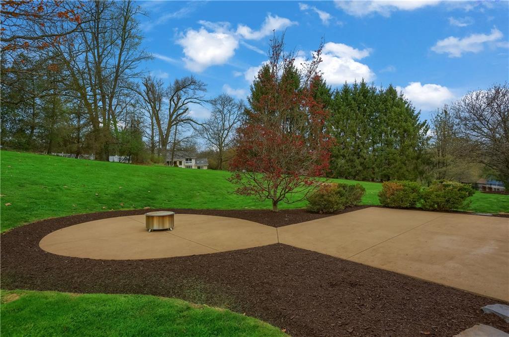 110 Larkspur Circle Butler, PA 16002 - Photo 44 of 50 The professional landscaping complements the patios and their design.