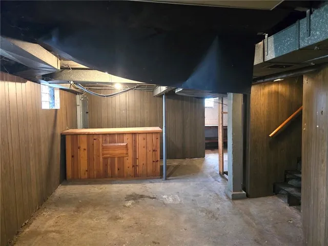 a sink with granite countertop a sink and cabinets