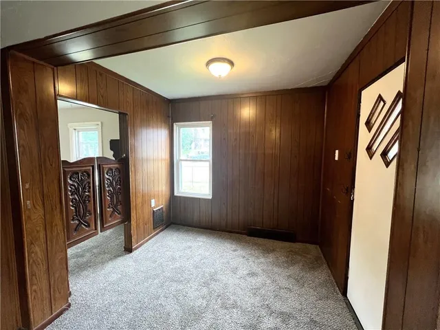 a view of empty room with front door