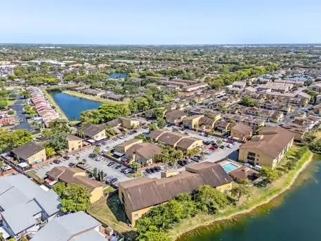 an aerial view of residential building with outdoor space