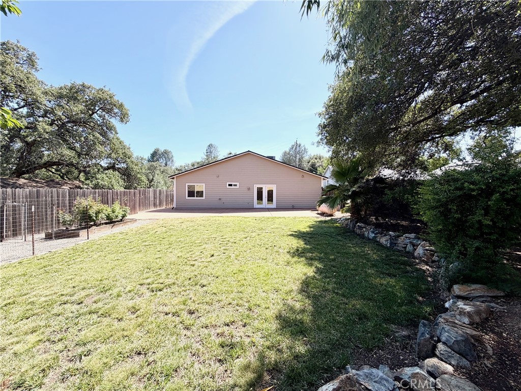 1037 Mark Twain Road Angels Camp, CA 95222 - Photo 50 of 52 a large house with a big yard and large trees