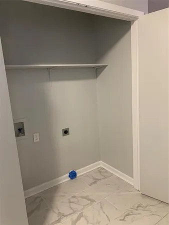 a kitchen with a stove and a microwave