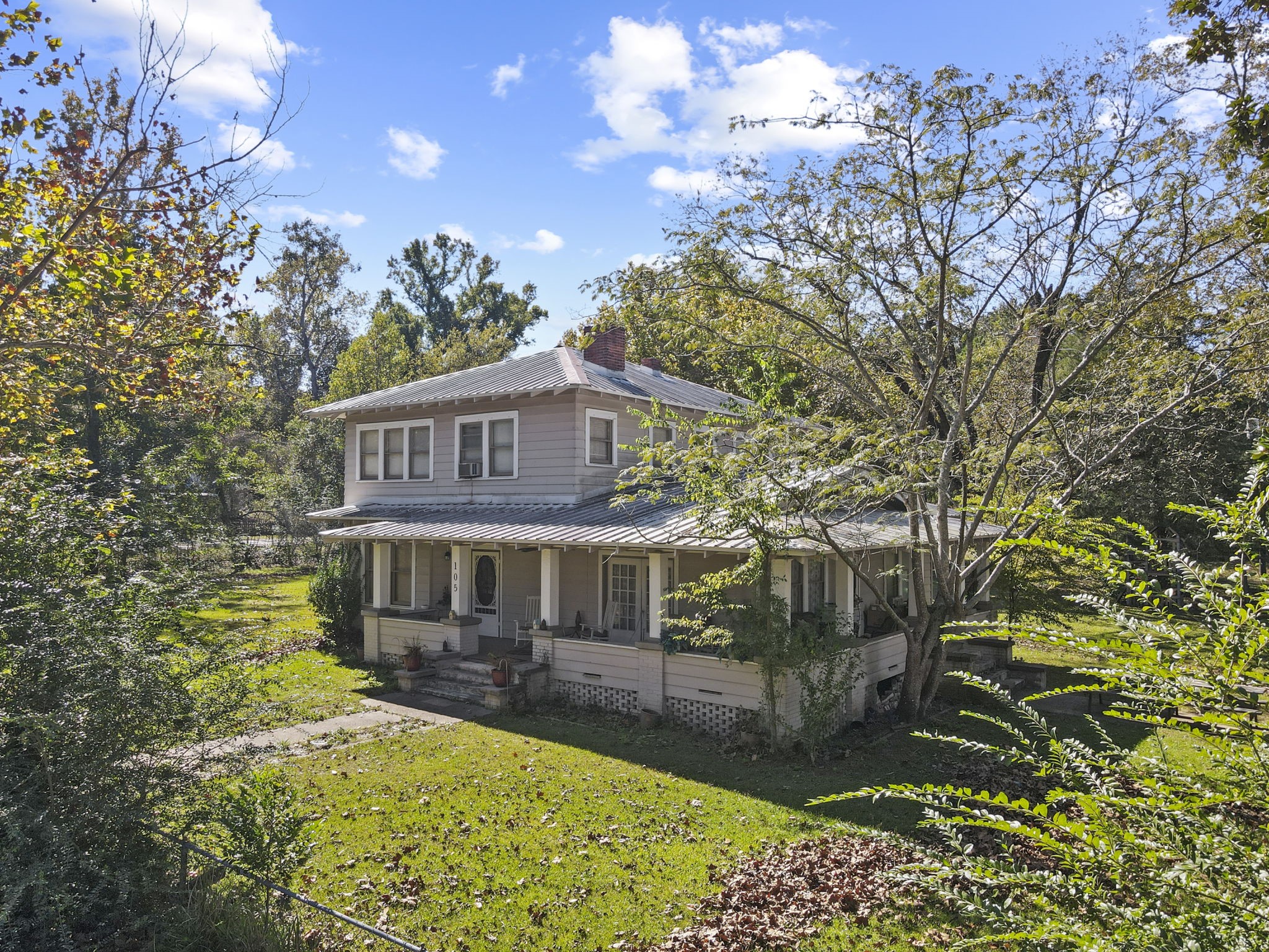 105 Mann Street Colmesneil, TX 75938 - Photo 33 of 40 a view of a house with a yard