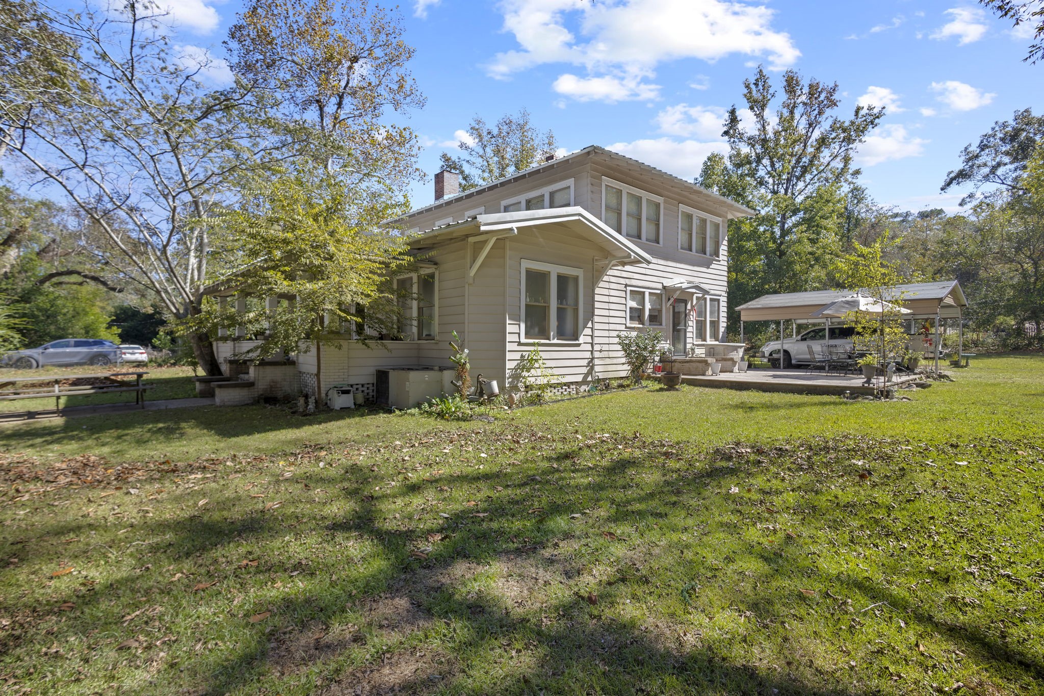105 Mann Street Colmesneil, TX 75938 - Photo 34 of 40 a front view of a house with garden