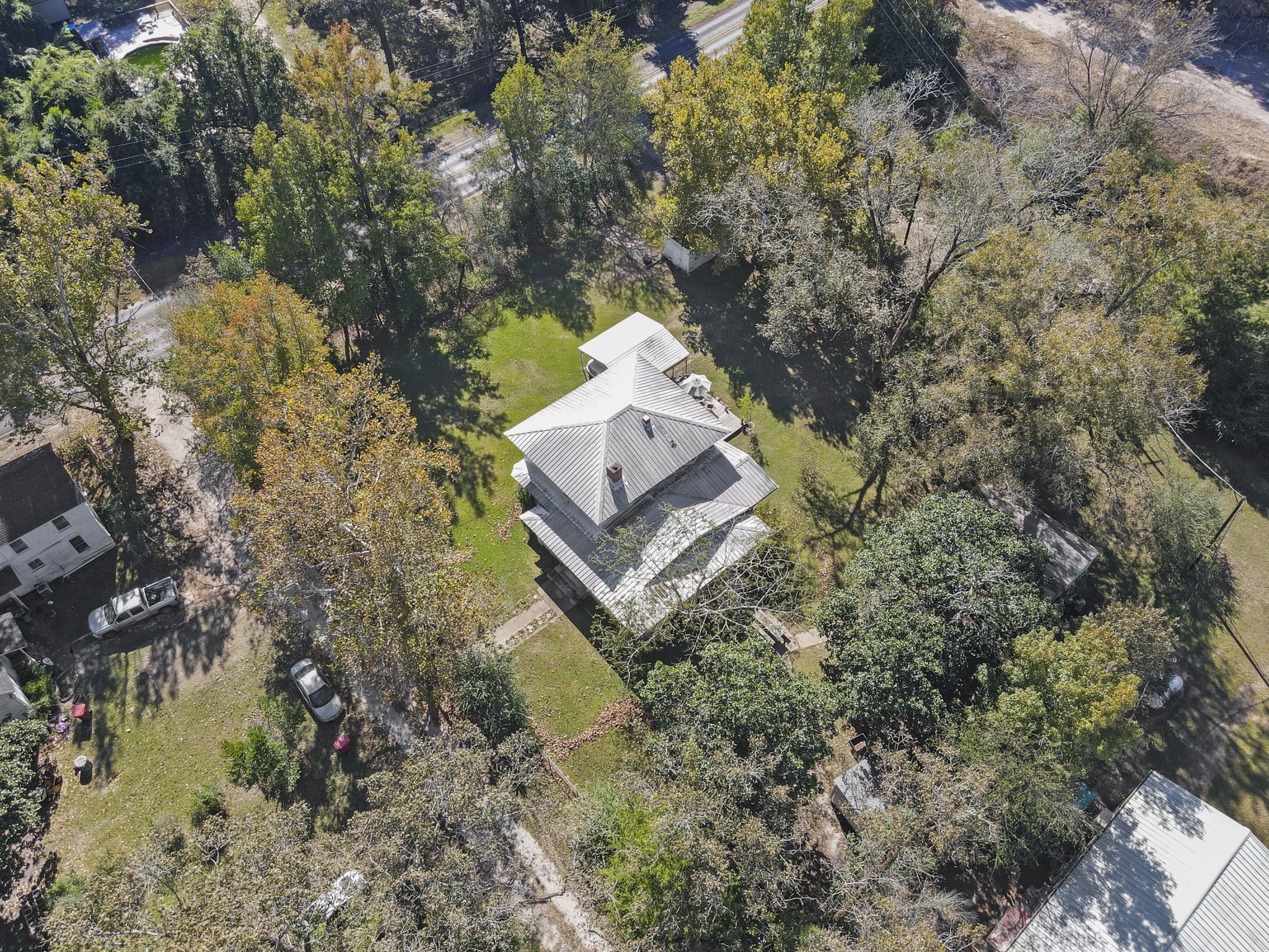 105 Mann Street Colmesneil, TX 75938 - Photo 39 of 40 an aerial view of a house with a yard