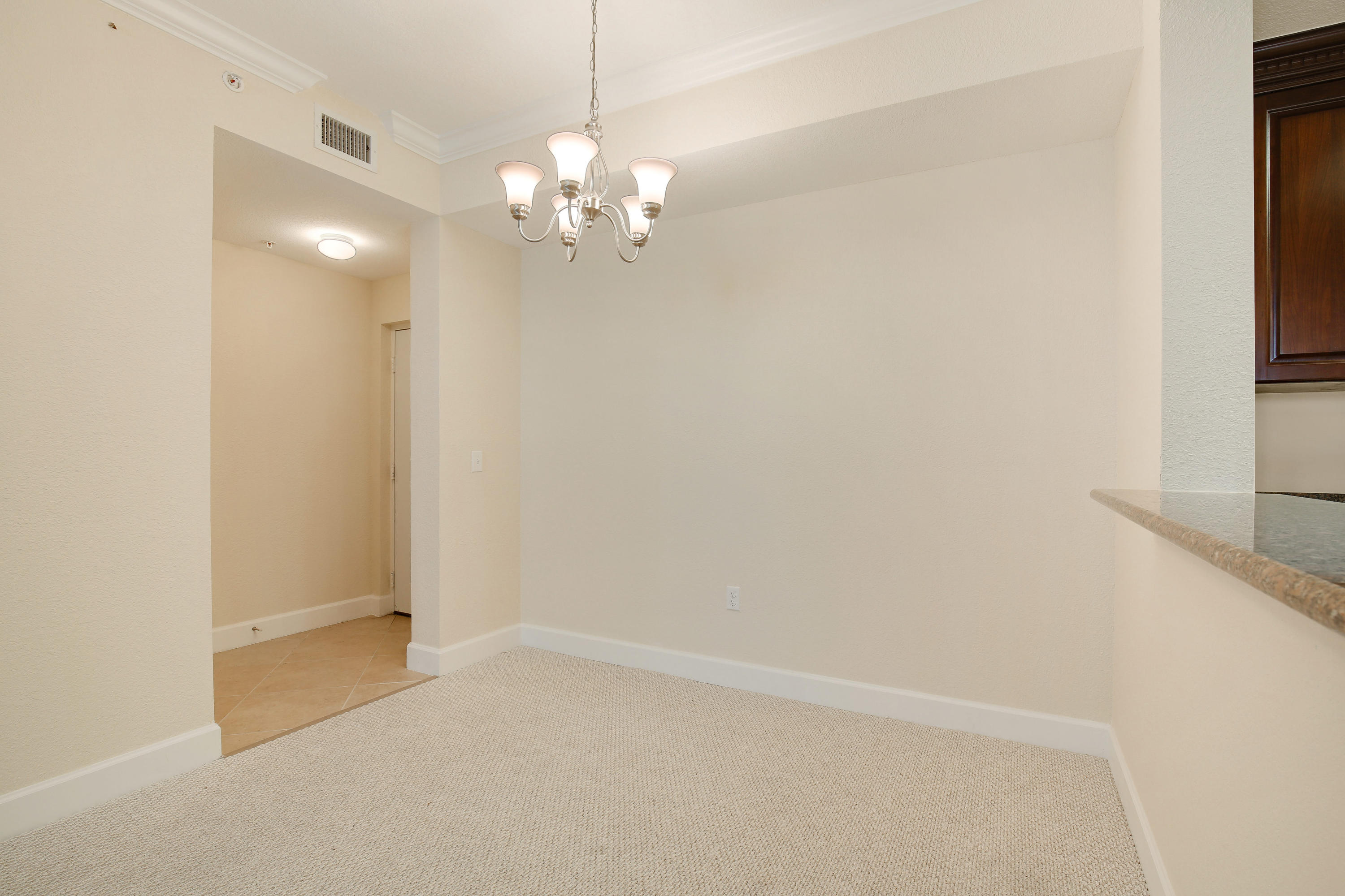 1690 Renaissance Commons Boulevard, Unit 1420 Boynton Beach, FL 33426 - Photo 2 of 22 Entryway/Dining Area
