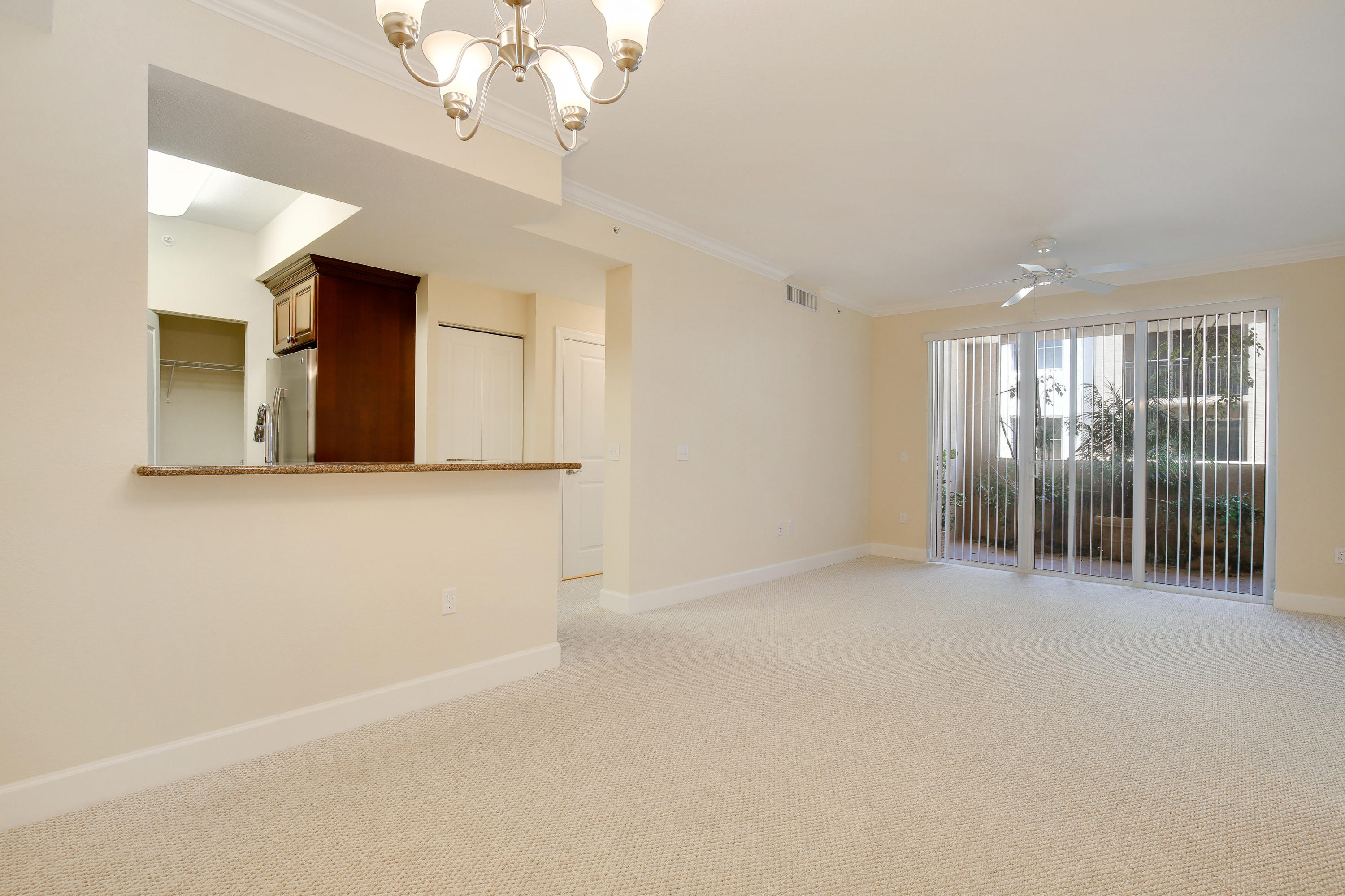 1690 Renaissance Commons Boulevard, Unit 1420 Boynton Beach, FL 33426 - Photo 4 of 22 Living Room/Dining Area