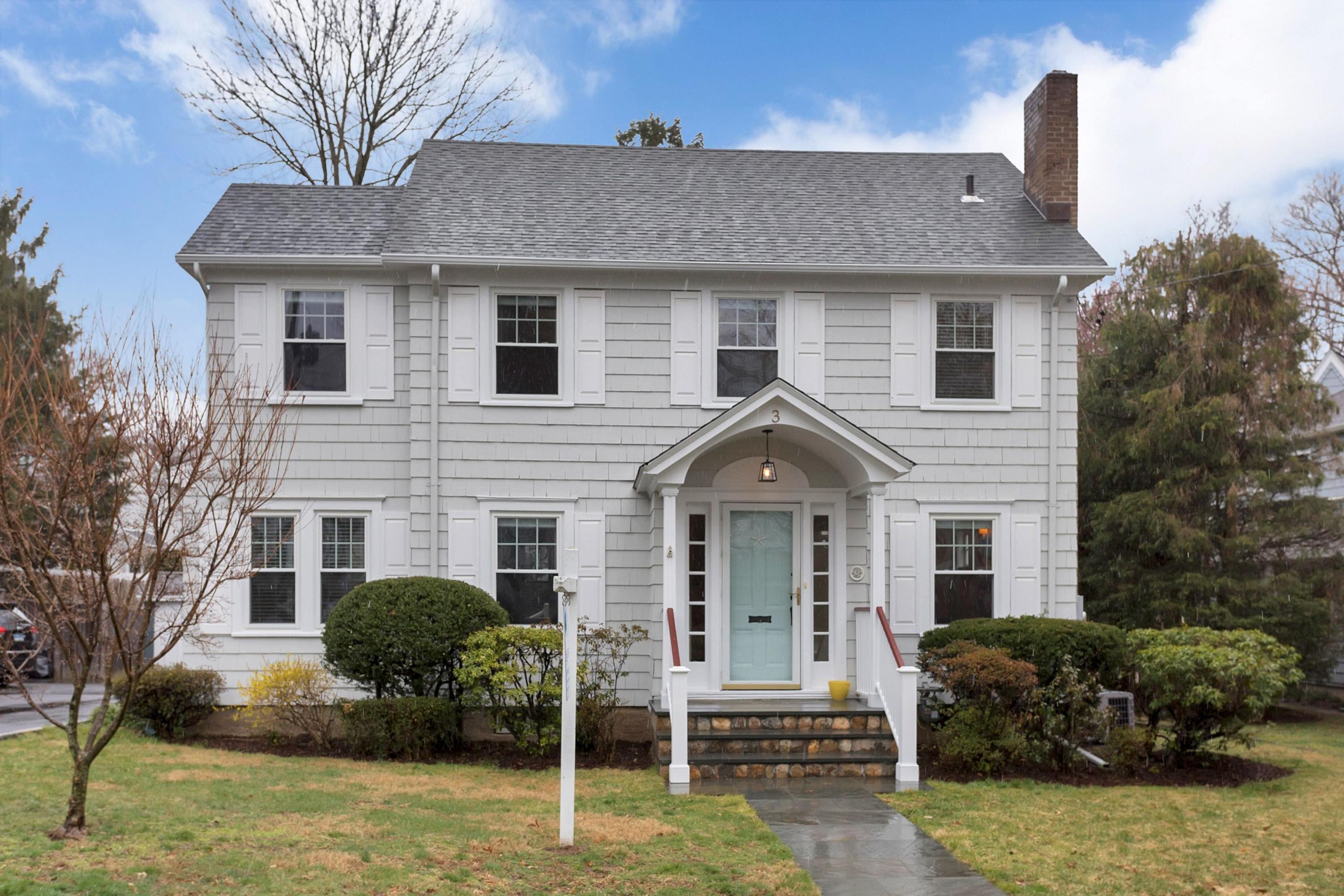 3 Abbey Road Darien, CT 06820 - Photo 1 of 5 a front view of a house with a yard