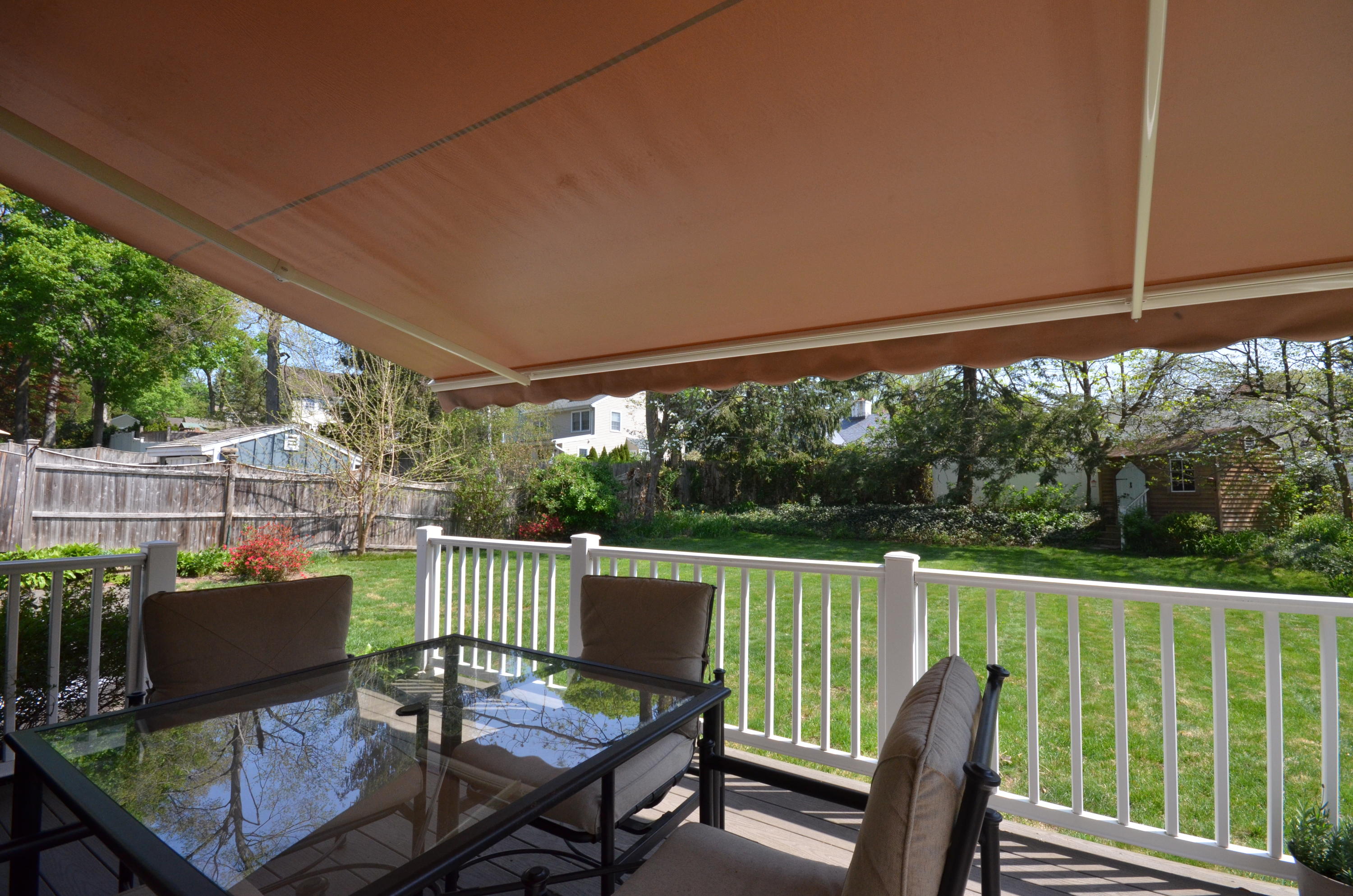 3 Abbey Road Darien, CT 06820 - Photo 4 of 5 a view of a chair and table on the roof deck