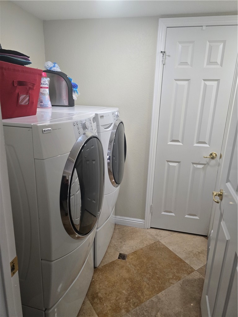 41740 Firenze Street Lancaster, CA 93536 - Photo 26 of 53 a utility room with dryer and washer