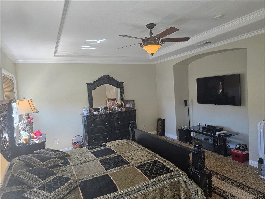41740 Firenze Street Lancaster, CA 93536 - Photo 33 of 53 a bedroom with a bed and wooden floor