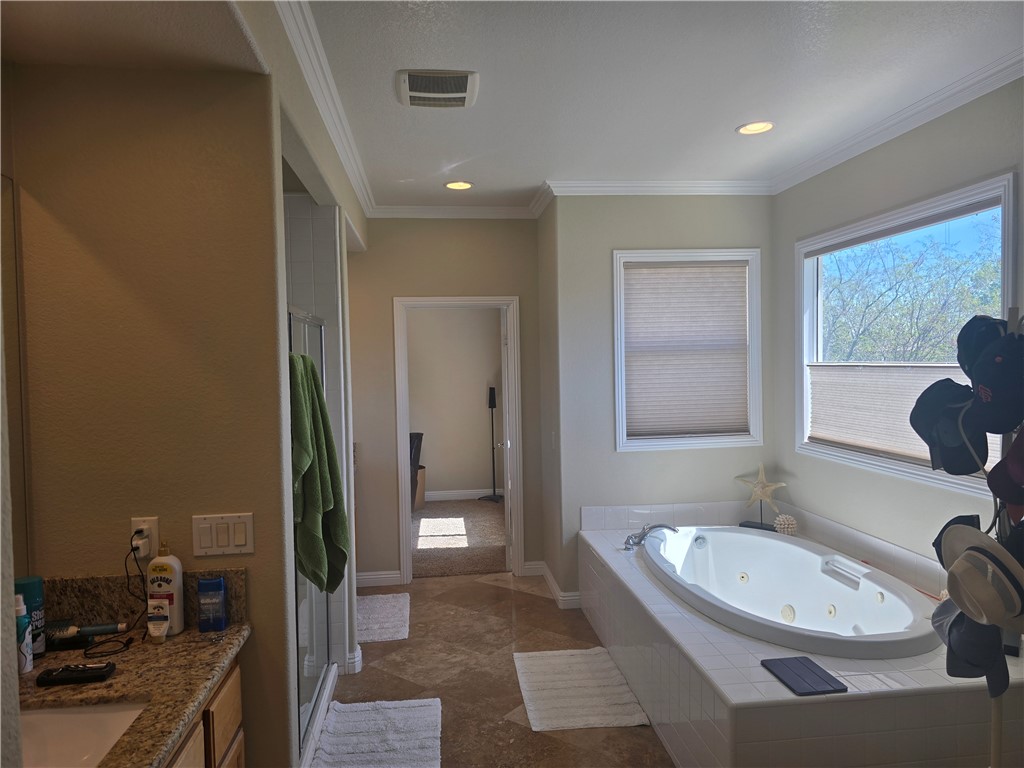 41740 Firenze Street Lancaster, CA 93536 - Photo 34 of 53 a bathroom with a granite countertop sink and a mirror