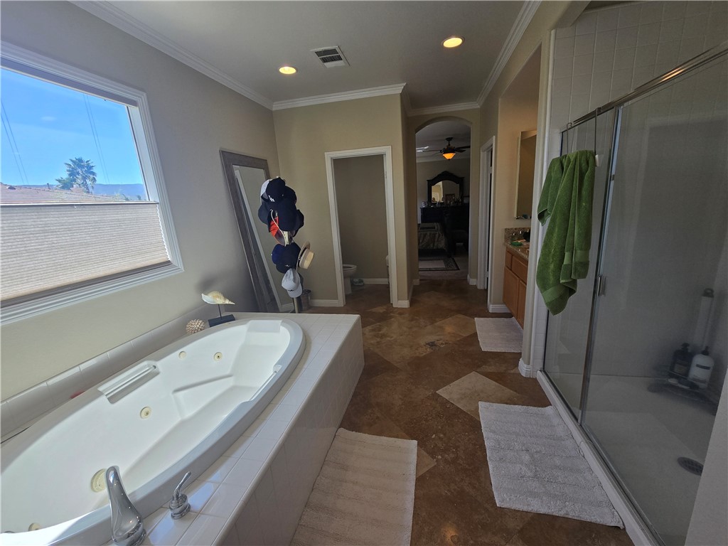 41740 Firenze Street Lancaster, CA 93536 - Photo 38 of 53 a bathroom with a double vanity sink and a mirror
