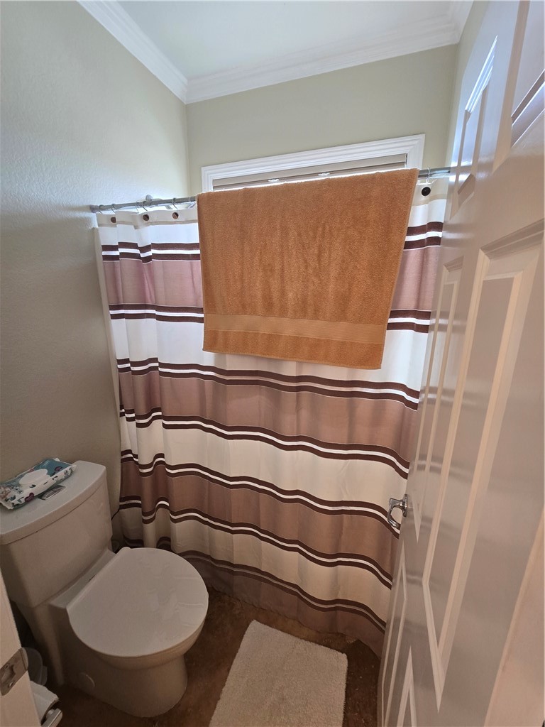 41740 Firenze Street Lancaster, CA 93536 - Photo 46 of 53 a bathroom with a toilet and a shower