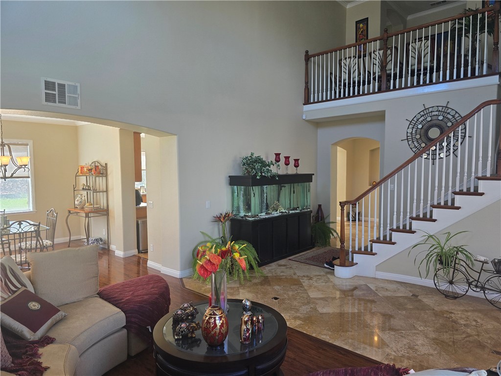 41740 Firenze Street Lancaster, CA 93536 - Photo 7 of 53 a living room with furniture and wooden floor