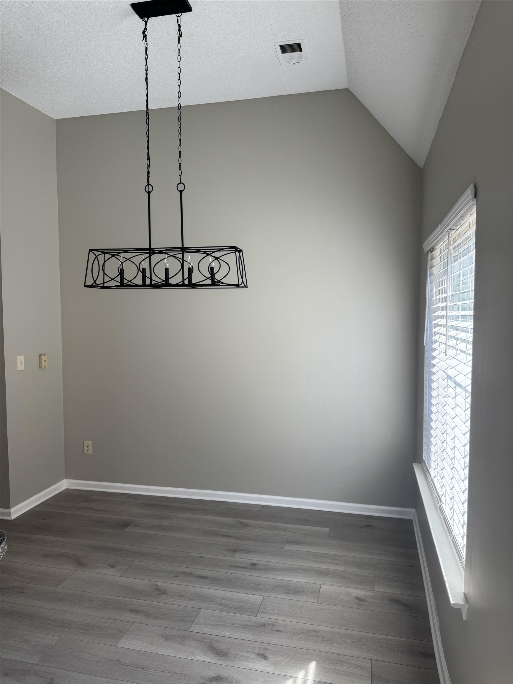 4929 Whitfall Cove South Memphis, TN 38125 - Photo 7 of 22 a view of a room with a window and wooden floor