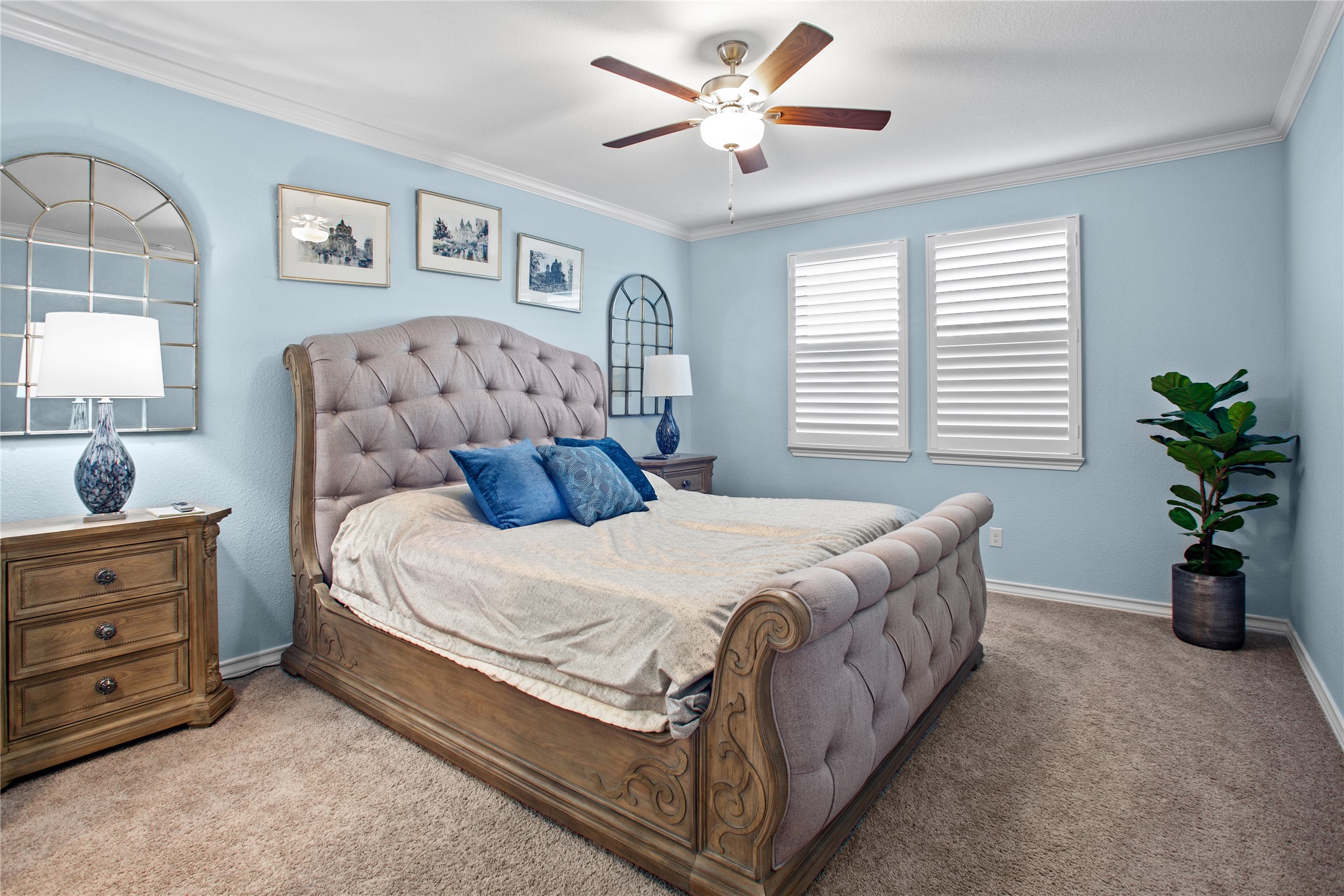 109 Adeline Road Hutto, TX 78634 - Photo 18 of 40 Bedroom with ornamental molding, carpet flooring, and ceiling fan