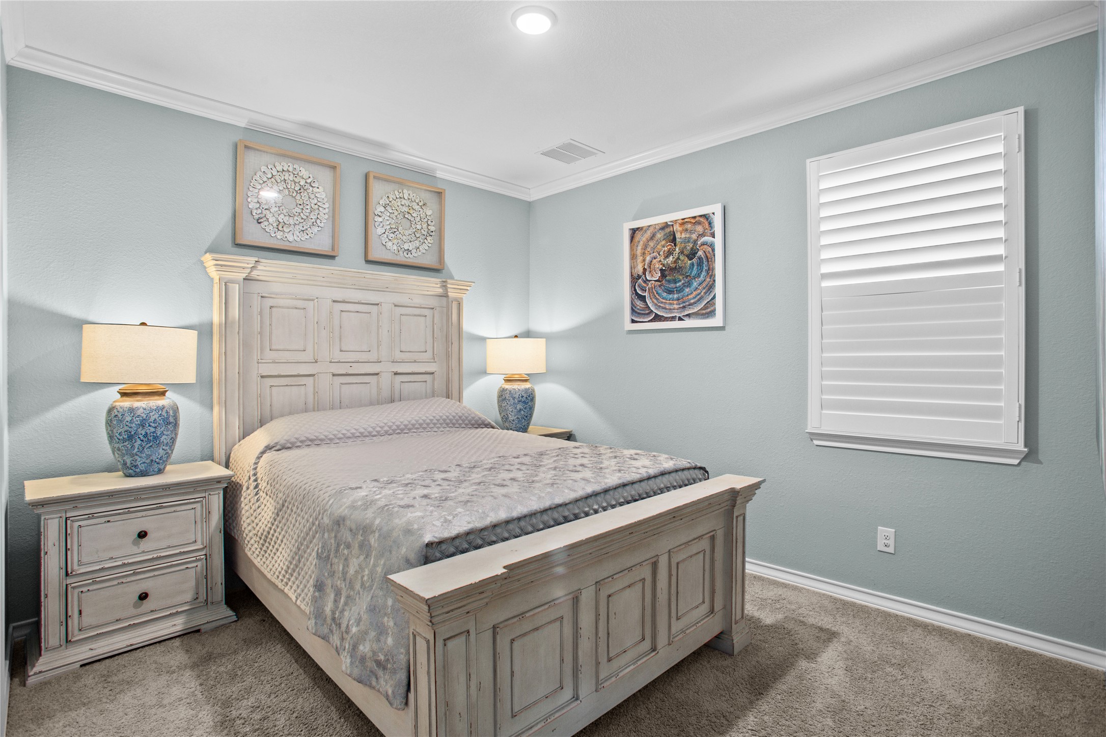 109 Adeline Road Hutto, TX 78634 - Photo 24 of 40 Bedroom featuring carpet and ornamental molding