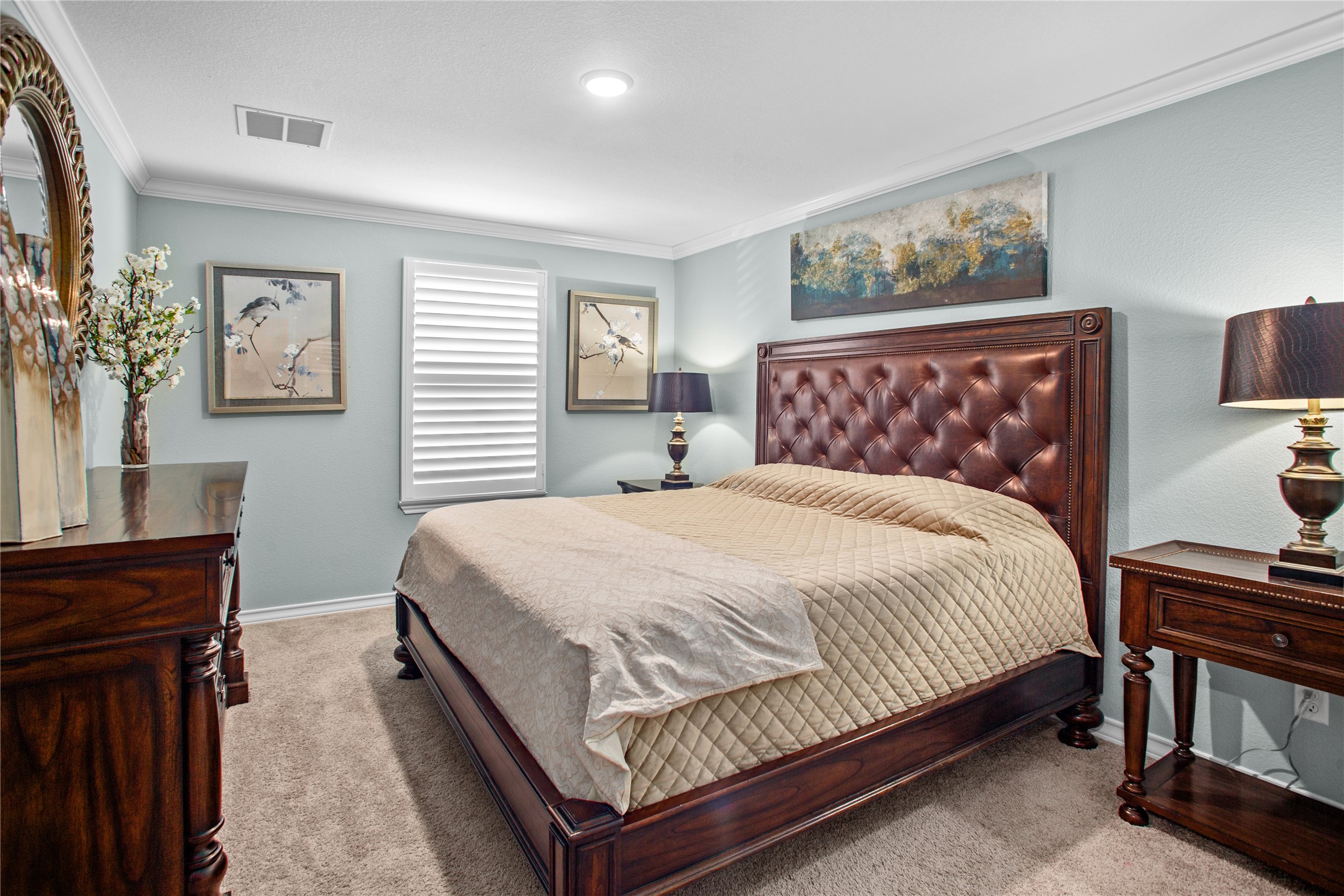 109 Adeline Road Hutto, TX 78634 - Photo 29 of 40 Carpeted bedroom with ornamental molding