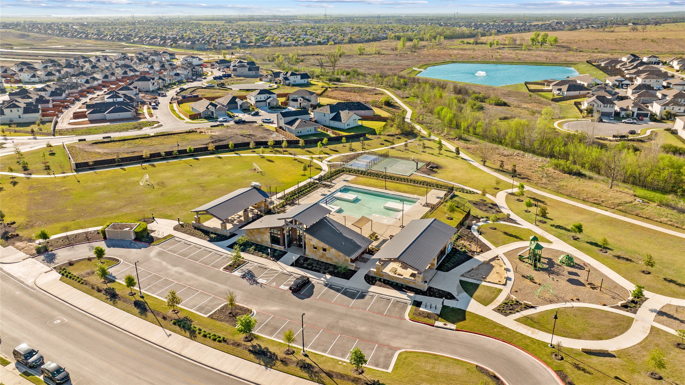 109 Adeline Road Hutto, TX 78634 - Photo 32 of 40 Aerial overview of property's location with a nearby body of water and nearby suburban area