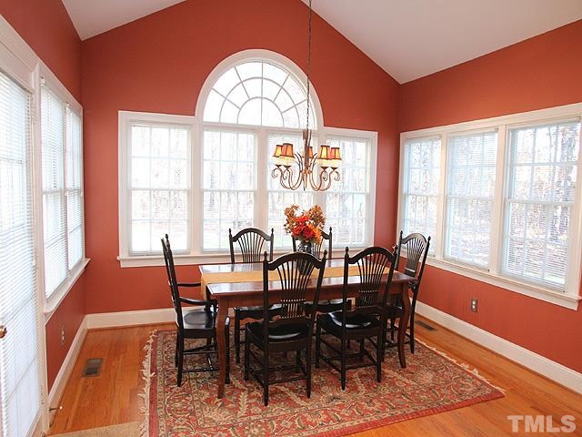 2400 Eddystone Road Raleigh, NC 27612 - Photo 14 of 25 Cathedral Ceiling & Palladium Window for Breakfast Rm/Sunroom Area! Looks into the over 1/2 Acre Backyard! The Backyard is Fenced and Private!