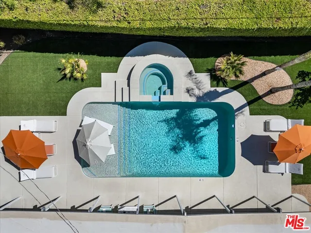 a view of a house with a yard porch and sitting area