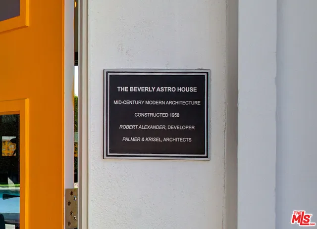 a view of a storage & utility room with a washer dryer