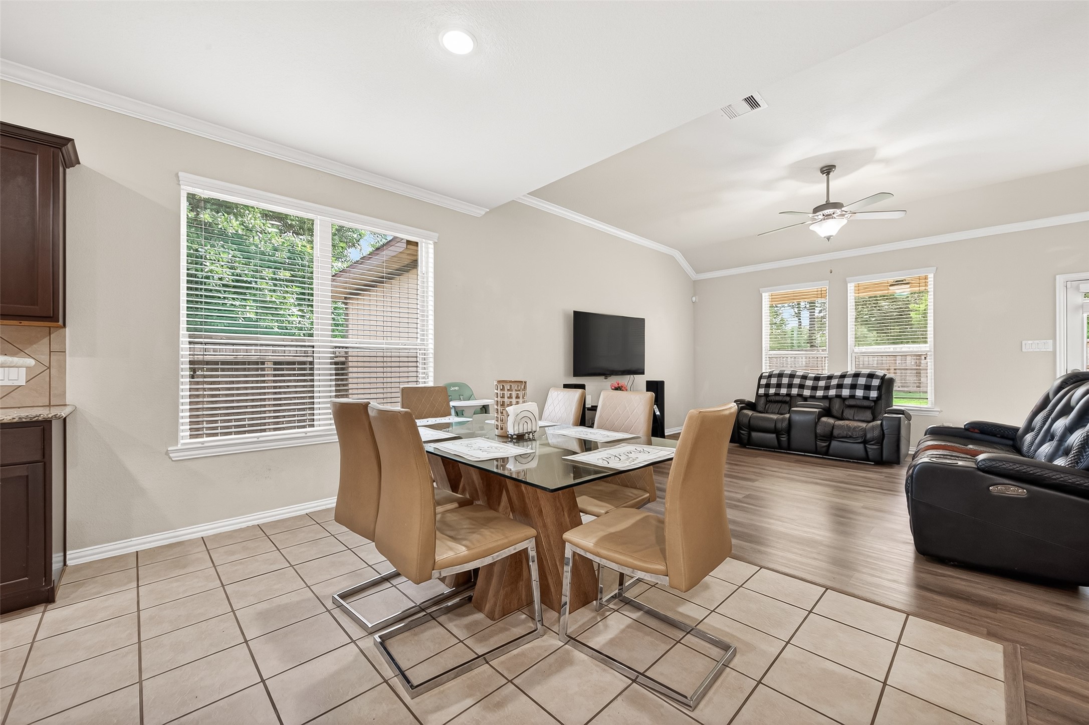 8 Landscape Court Conroe, TX 77301 - Photo 12 of 43 a view of a dining room with furniture