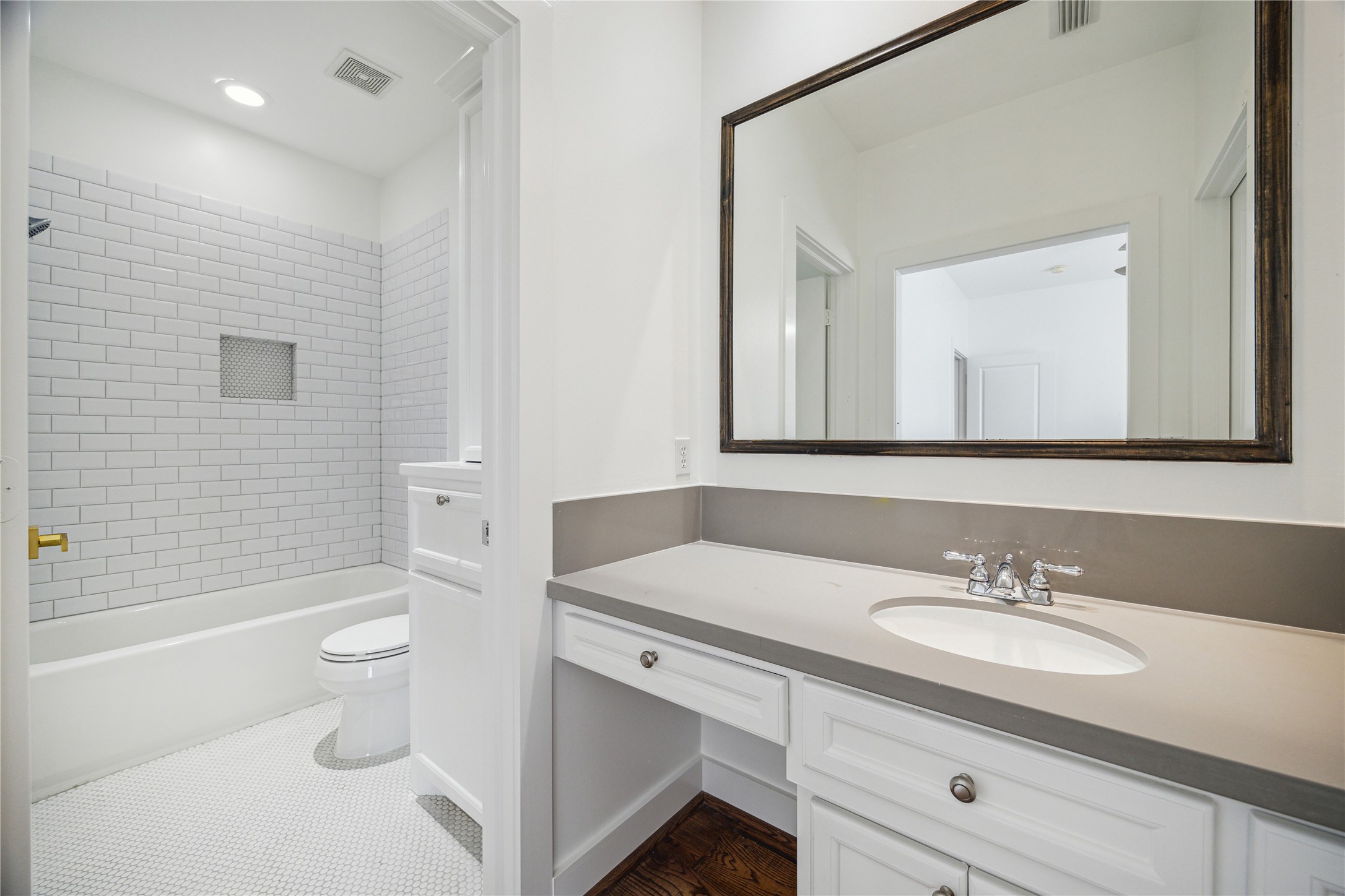 1238 West 22nd Street Houston, TX 77008 - Photo 23 of 39 Shower/tub combination with all plumbing fixtures by Kohler