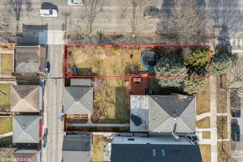 an aerial view of a houses with outdoor space