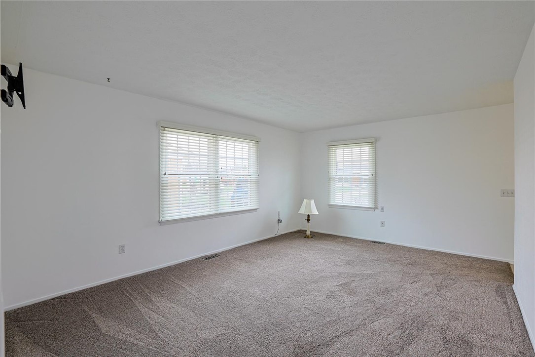 4307 Meadowcroft Road Dayton, OH 45429 - Photo 6 of 26 This expansive room offers abundant natural light, creating an inviting and airy atmosphere.