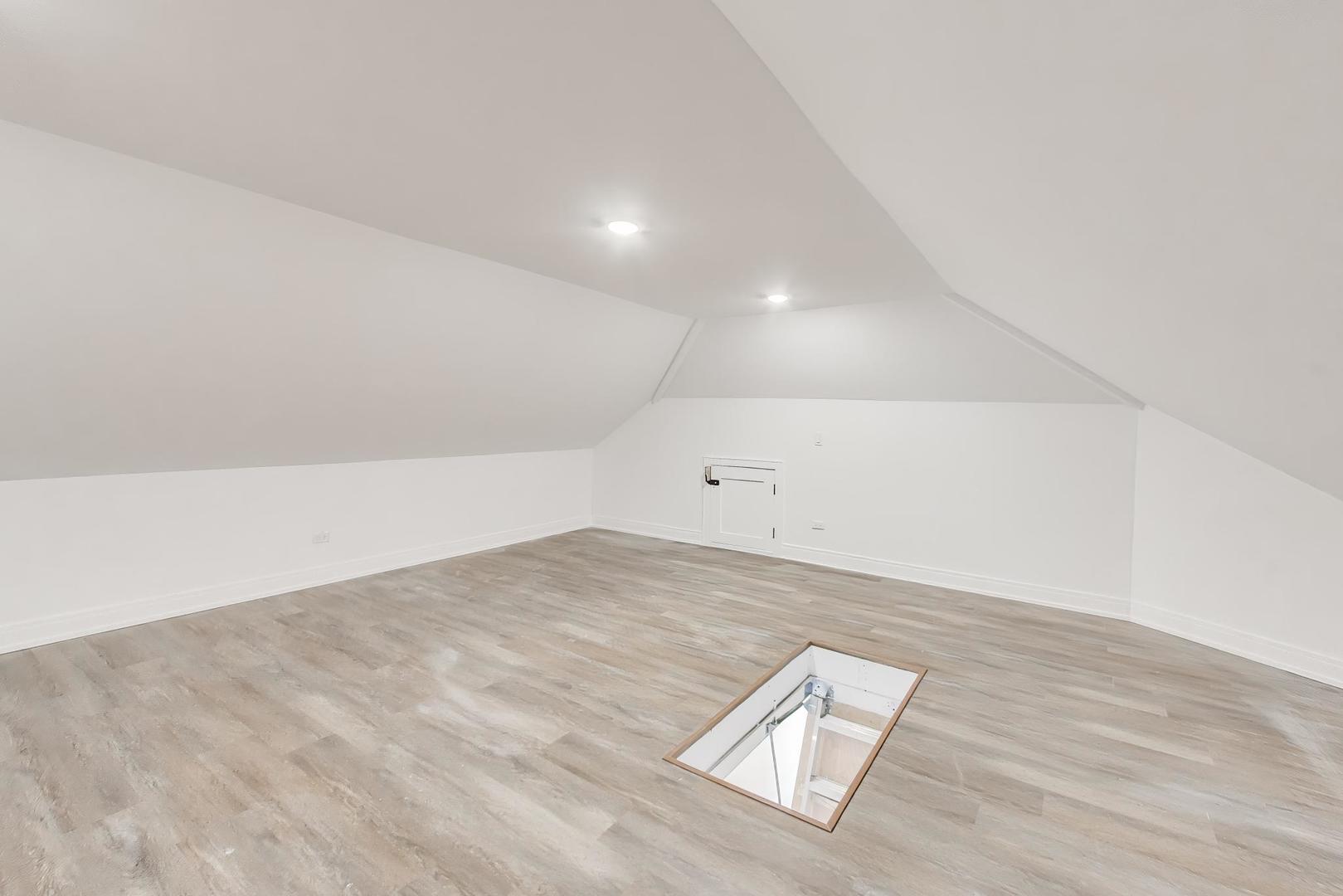280 Blackhawk Road Riverside, IL 60546 - Photo 32 of 51 an empty room with wooden floor