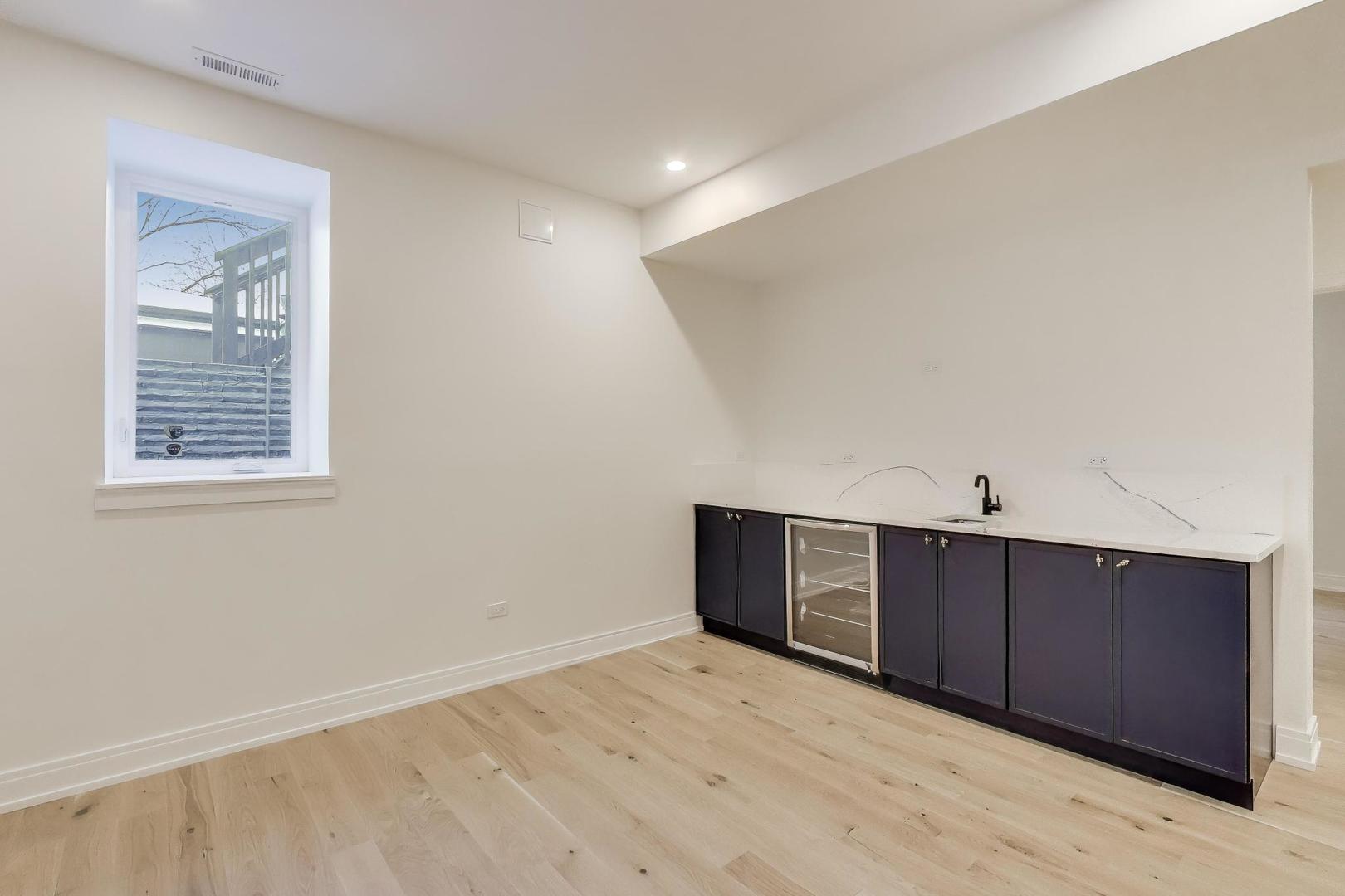 280 Blackhawk Road Riverside, IL 60546 - Photo 35 of 51 a view of an empty room with wooden floor