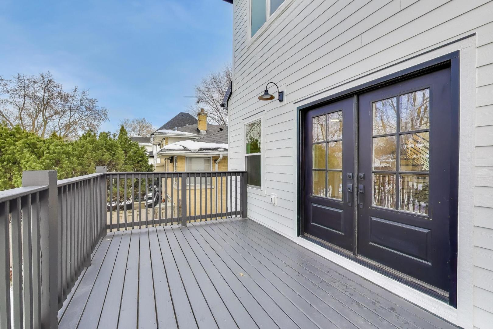 280 Blackhawk Road Riverside, IL 60546 - Photo 41 of 51 a view of a balcony with wooden floor