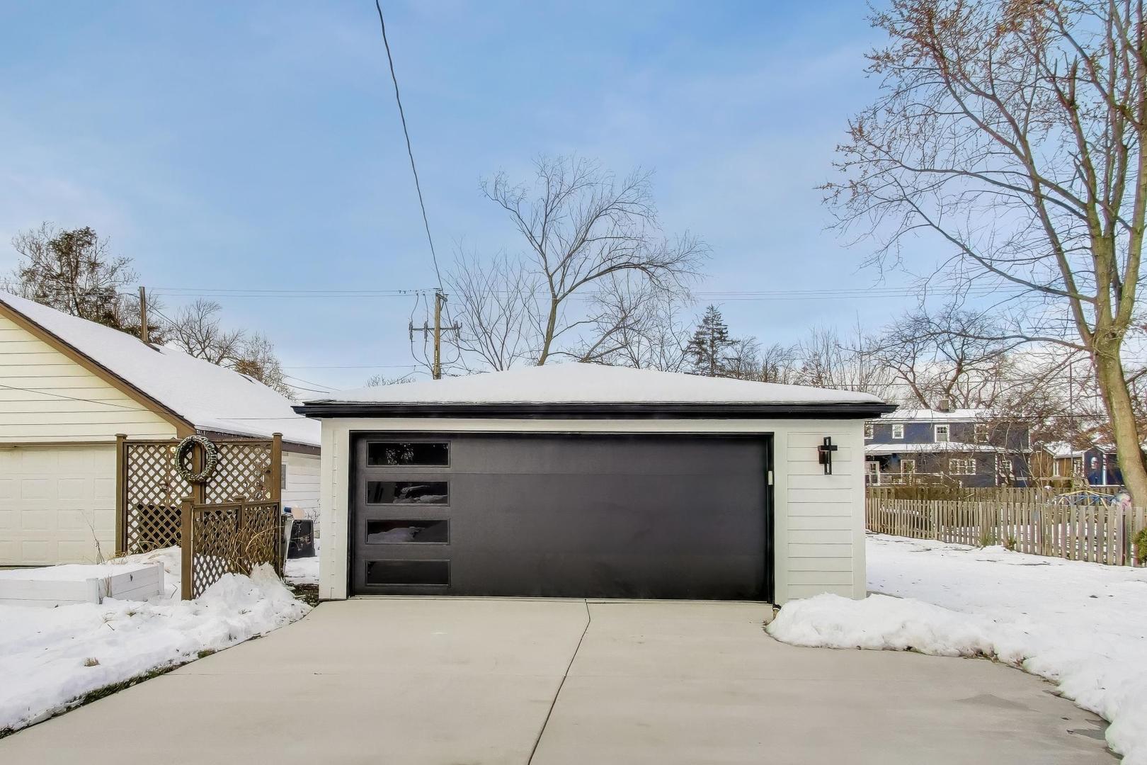 280 Blackhawk Road Riverside, IL 60546 - Photo 44 of 51 a front view of a house with a garage