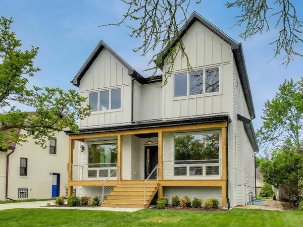 a view of house with yard