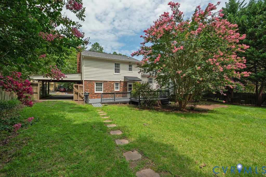 6901 Manning Road Chesterfield, VA 23832 - Photo 13 of 57 Expansive rear lawn featuring a stone-stepped path
