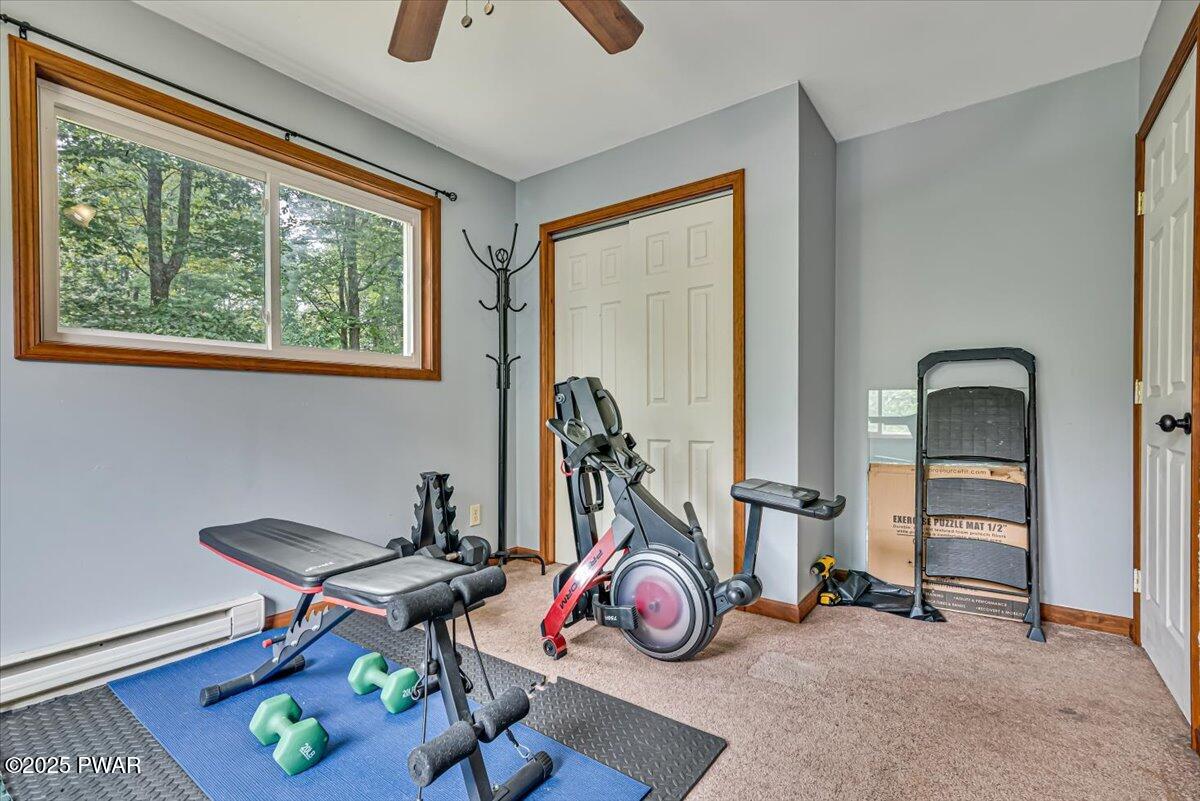 192 Heather Hill Road Dingmans Ferry, PA 18328 - Photo 29 of 74 a view of a room with gym equipment