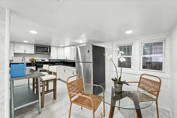 a living room with furniture and a couch