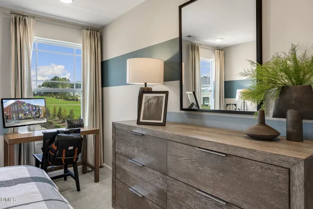 a kitchen with a table and chairs in it