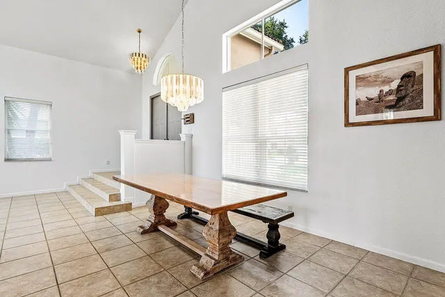 a bathroom with a bathtub and a window
