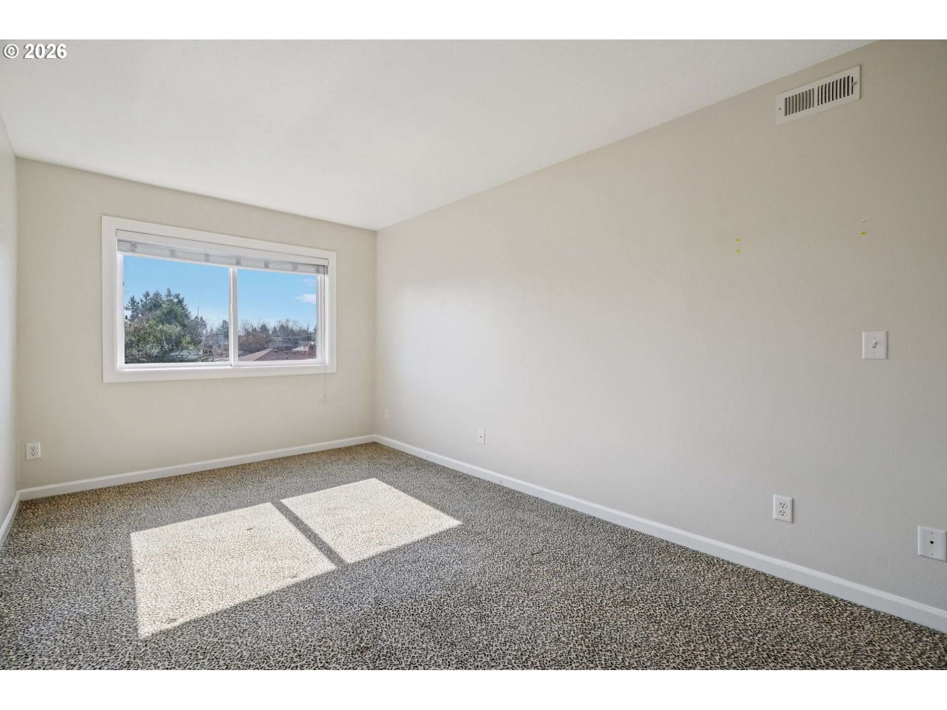 6600 Southeast Division Street, Unit 305 Portland, OR 97206 - Photo 25 of 34 an empty room with windows