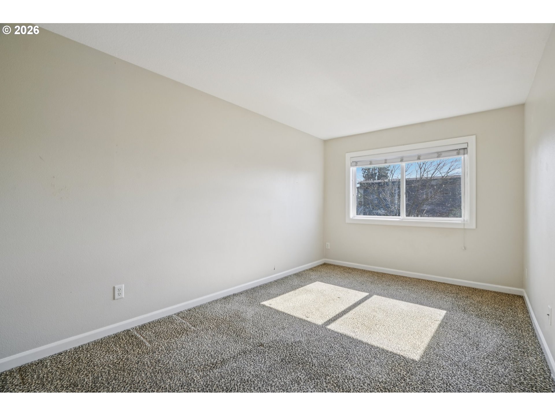 6600 Southeast Division Street, Unit 305 Portland, OR 97206 - Photo 26 of 34 an empty room with windows