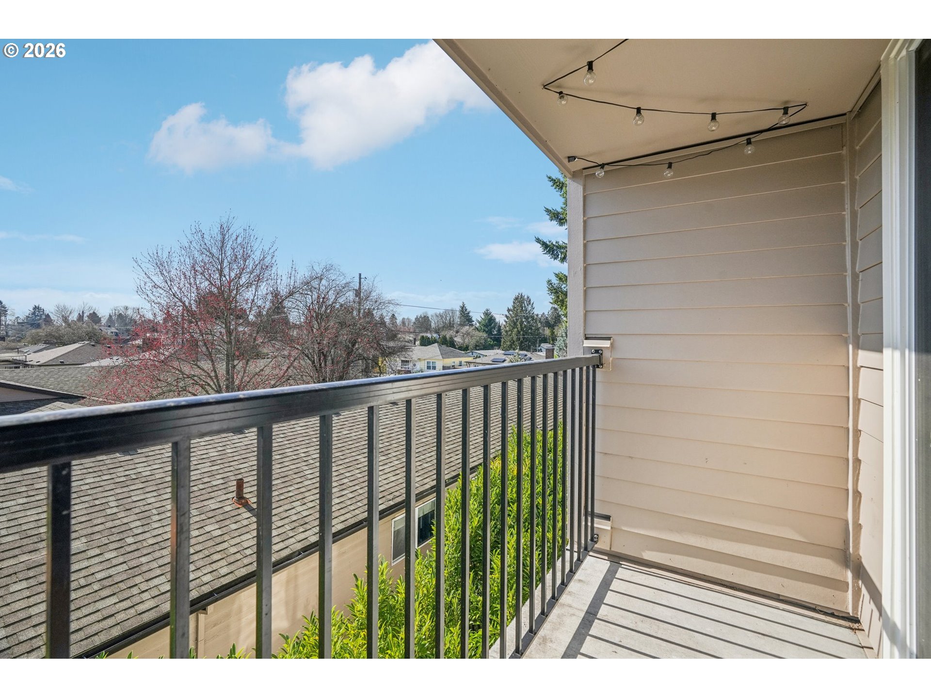 6600 Southeast Division Street, Unit 305 Portland, OR 97206 - Photo 29 of 34 a balcony with view of outdoor space