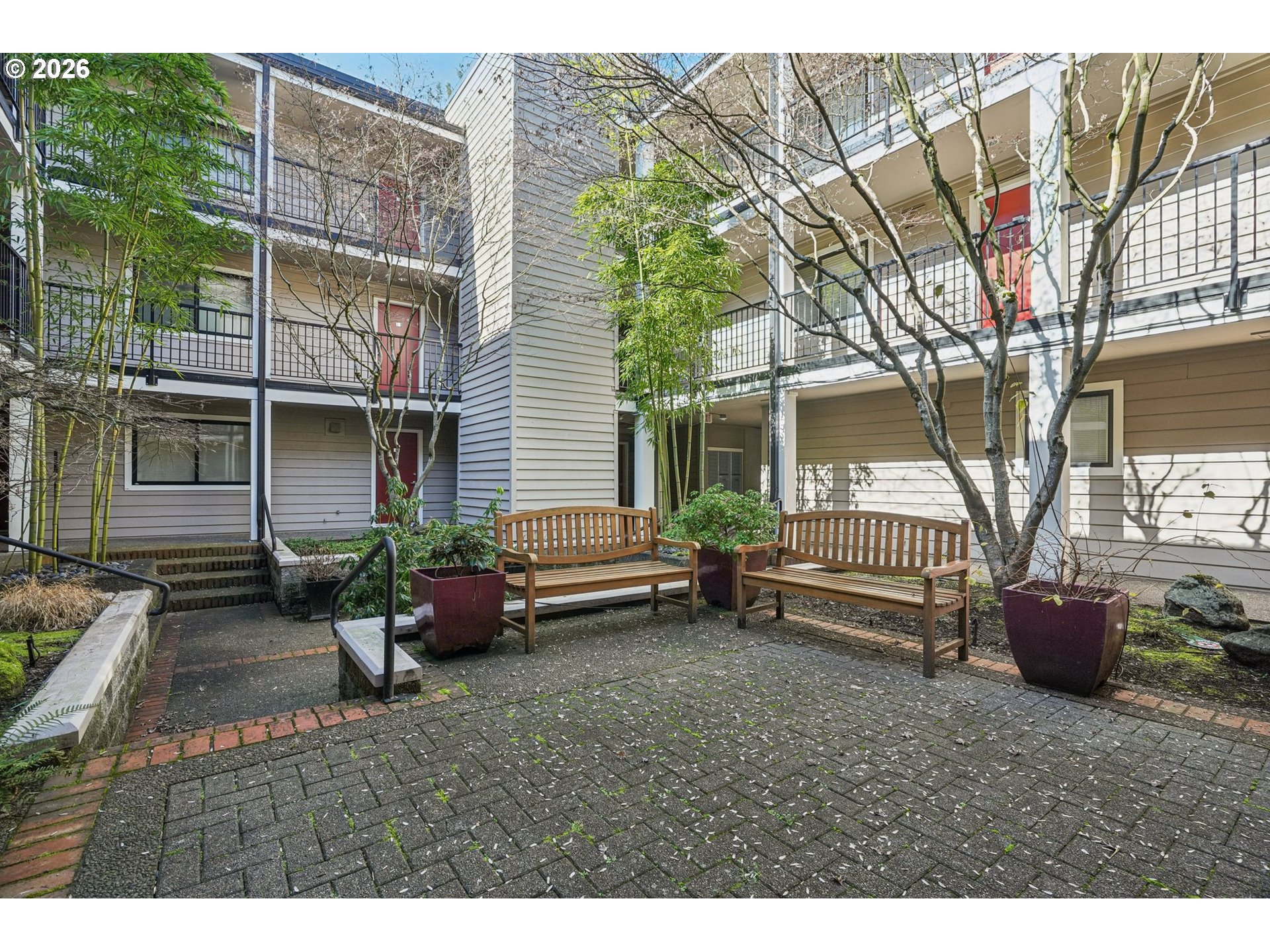 6600 Southeast Division Street, Unit 305 Portland, OR 97206 - Photo 31 of 34 a backyard of a house with barbeque oven