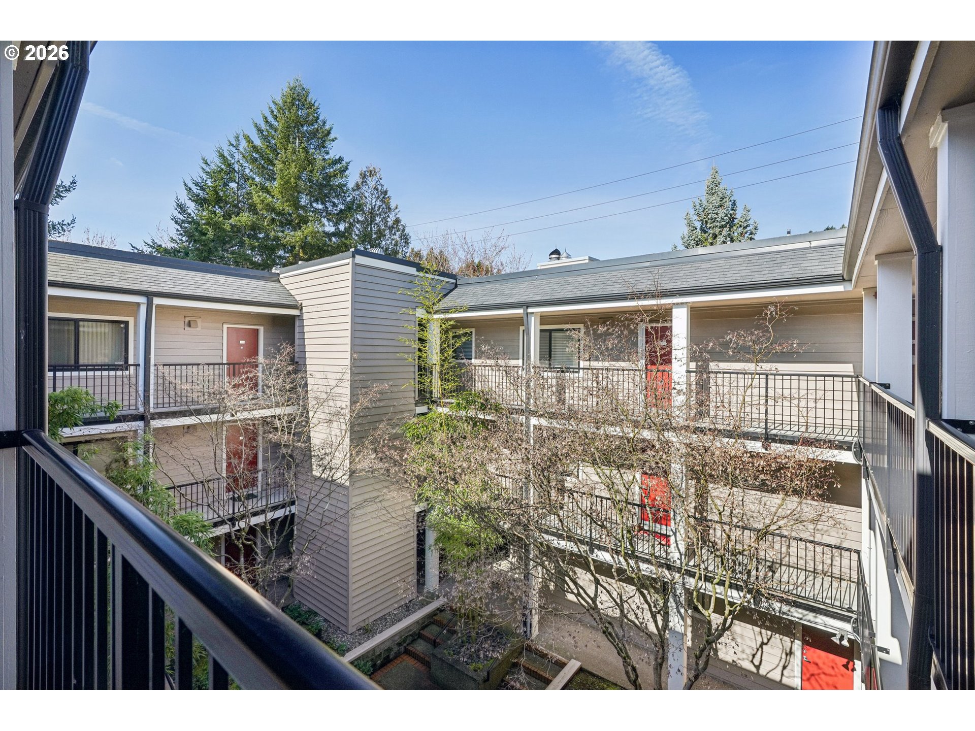 6600 Southeast Division Street, Unit 305 Portland, OR 97206 - Photo 33 of 34 a view of a house with a balcony
