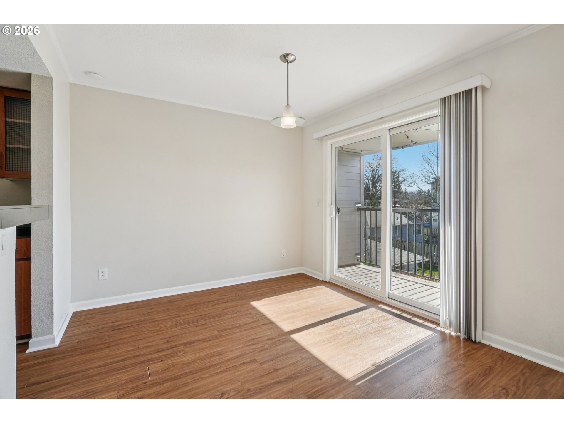 6600 Southeast Division Street, Unit 305 Portland, OR 97206 - Photo 9 of 34 a view interior of a house wooden floor and windows