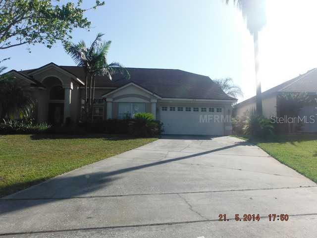 618 Waterscape Way Orlando, FL 32828 - Photo 1 of 1 a front view of a house with garden