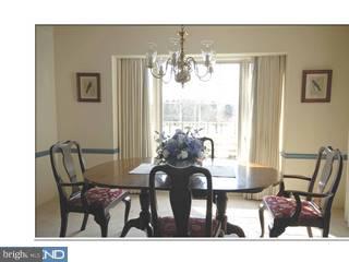 616 Bayard Road Kennett Square, PA 19348 - Photo 5 of 6 a view of a dining room with furniture and chandelier